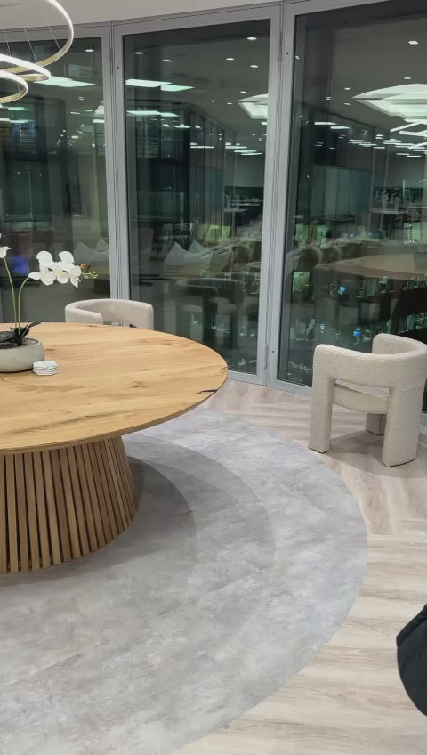 Handcrafted 4cm thick solid wood, oak round dining table extending from 100cm to 180cm for 4,6,8,10,12 seater. Available in black and white with chairs.
